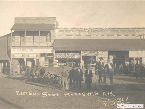 Taken about 1914. The two young dudes are standing on the town well pump.